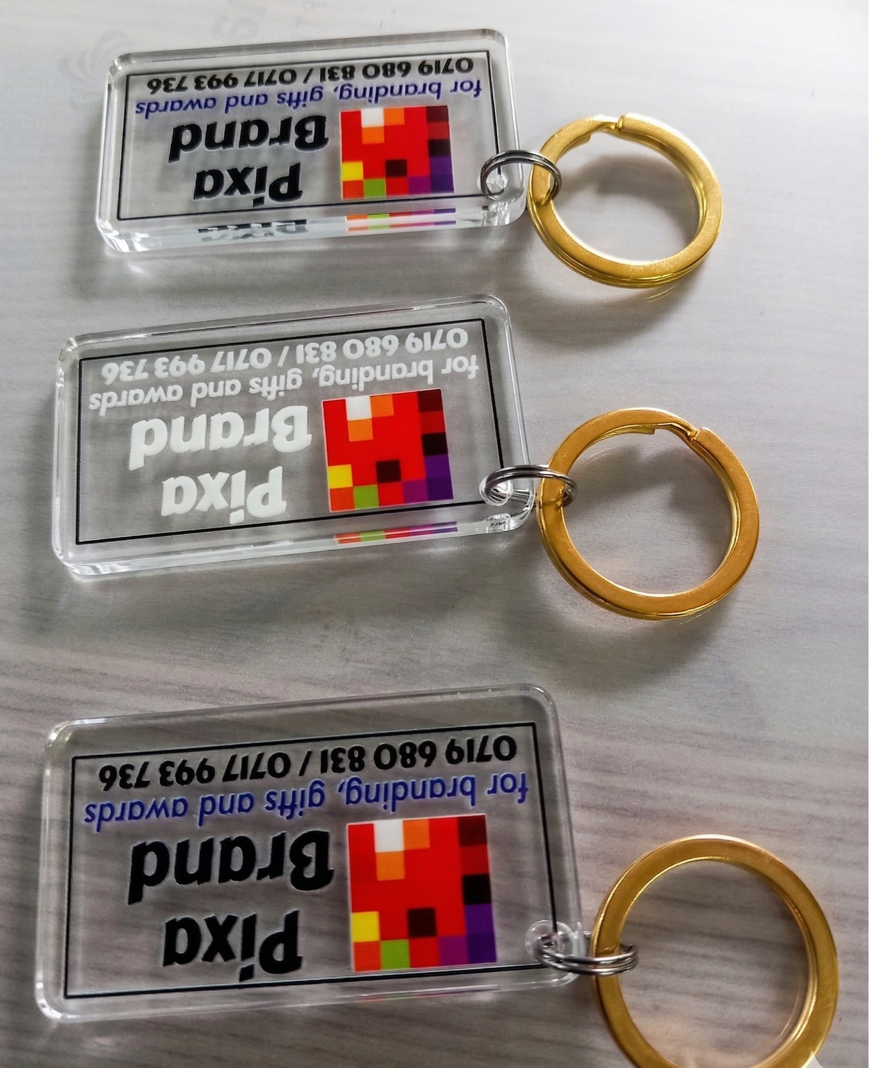 Branded Acrylic Keyholders - Custom Shape and Design UV Printed